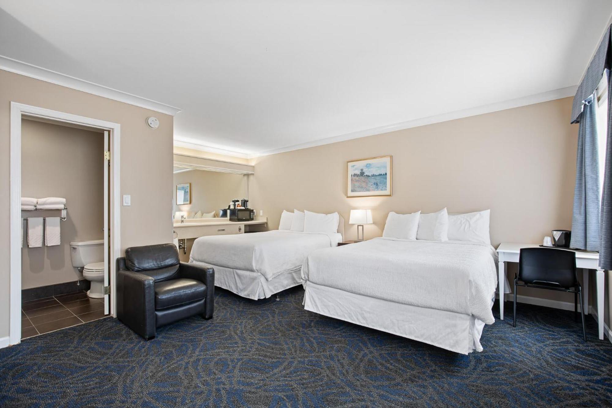 Glenwood Inn & Suites Trail Esterno foto